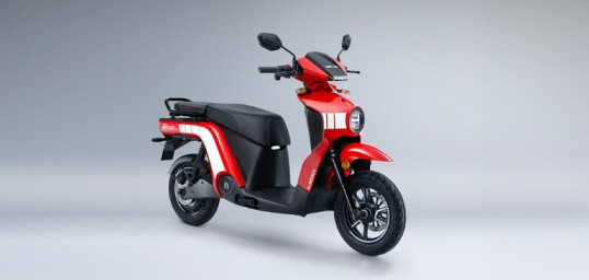 Numeros Motors Diplos Max electric scooter side view showing modern design and LED lighting features